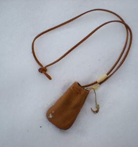 Peach Seen Primitive Fish Hook in Leather Medicine Bag Peach Seen Primitive Fish Hook in Leather Medicine Bag