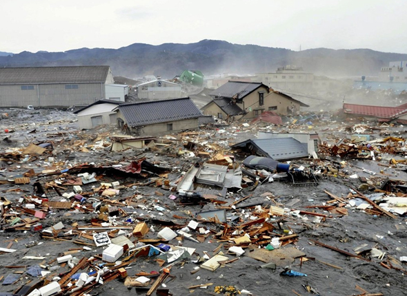 Coastal City in Japan Flooded by Tsunami